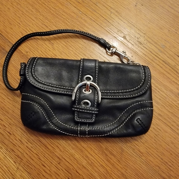 Coach Handbags - Coach black leather clutch